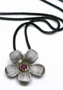 Sterling Silver Flower Pendant With Garnet On Black Rhodium Chain